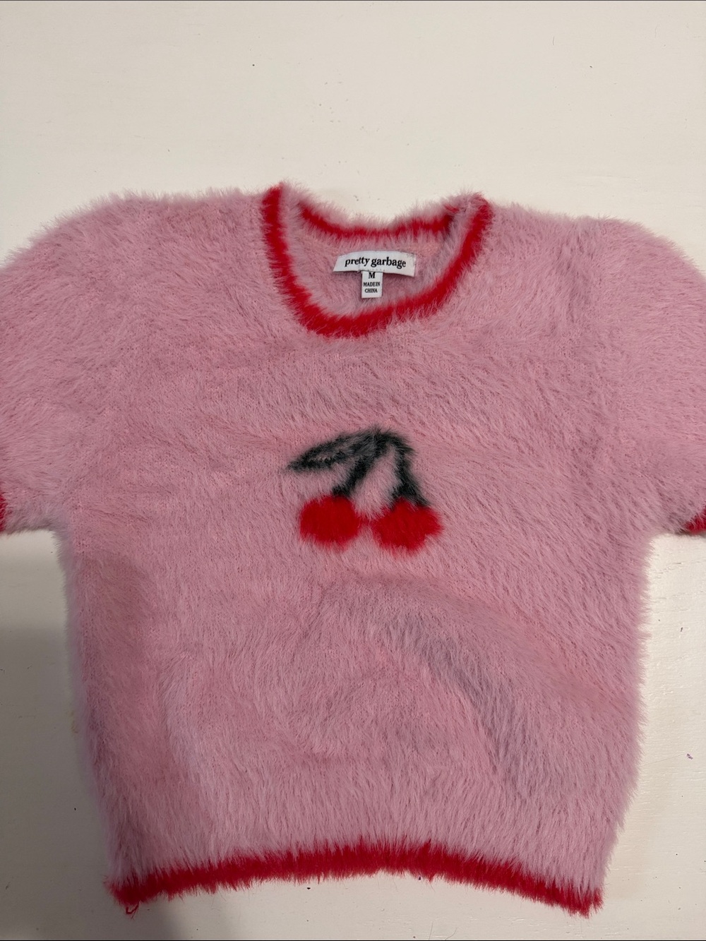 Pretty Garbage Pink Fuzzy Cherry Tee with Red Trim